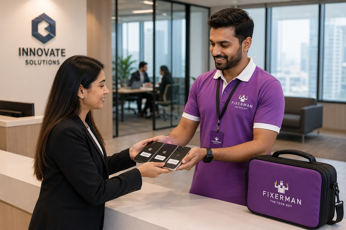 Fixerman staff collecting multiple iphoness from a corporate office for repair